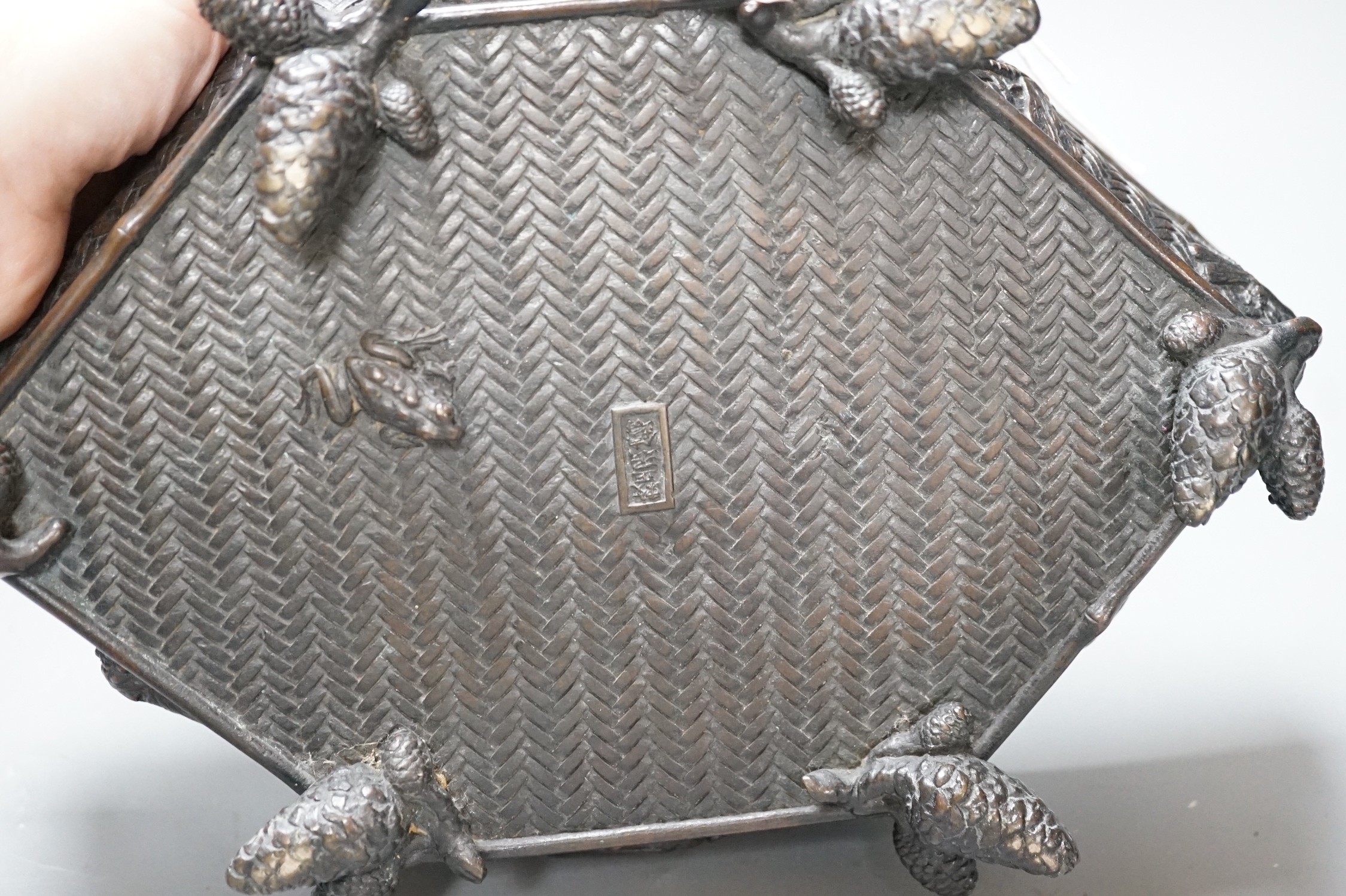 A Meiji period Japanese bronze hexagonal tray, signed to base. 29cm long